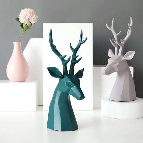 a pair of green and grey Deer figurine