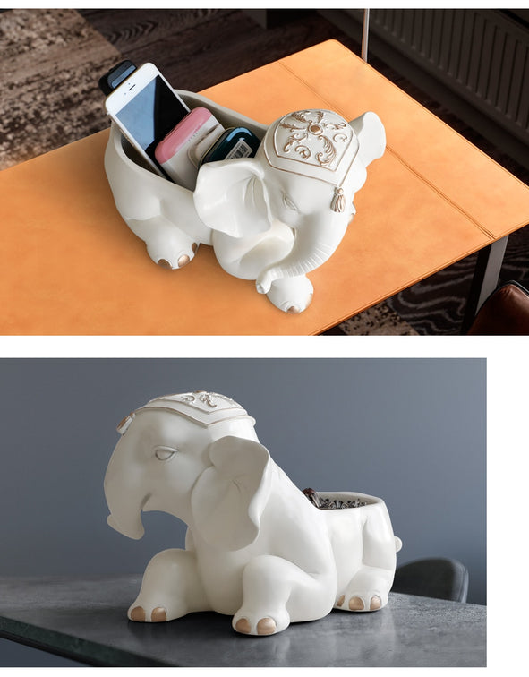 A pair of white elephant figurine