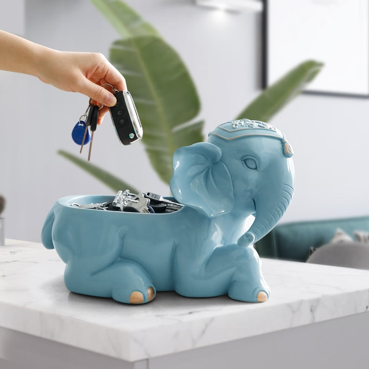 Blue elephant figurine storage