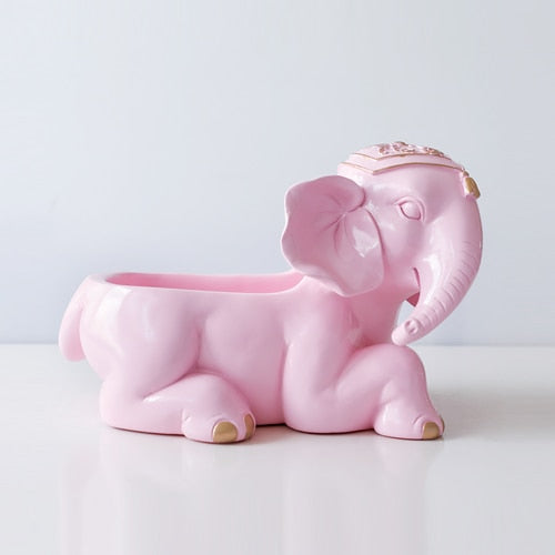 Pink elephant figurine storage
