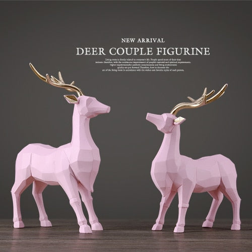 A pair of pink Deer figurine