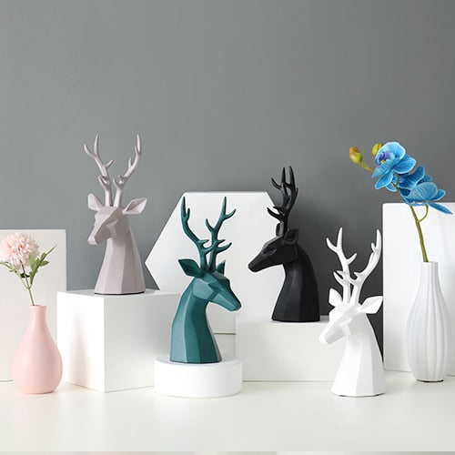 A collection of white, green, black Deer figurine