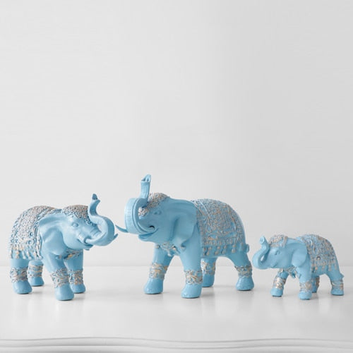 Light blue Elephant family figurine